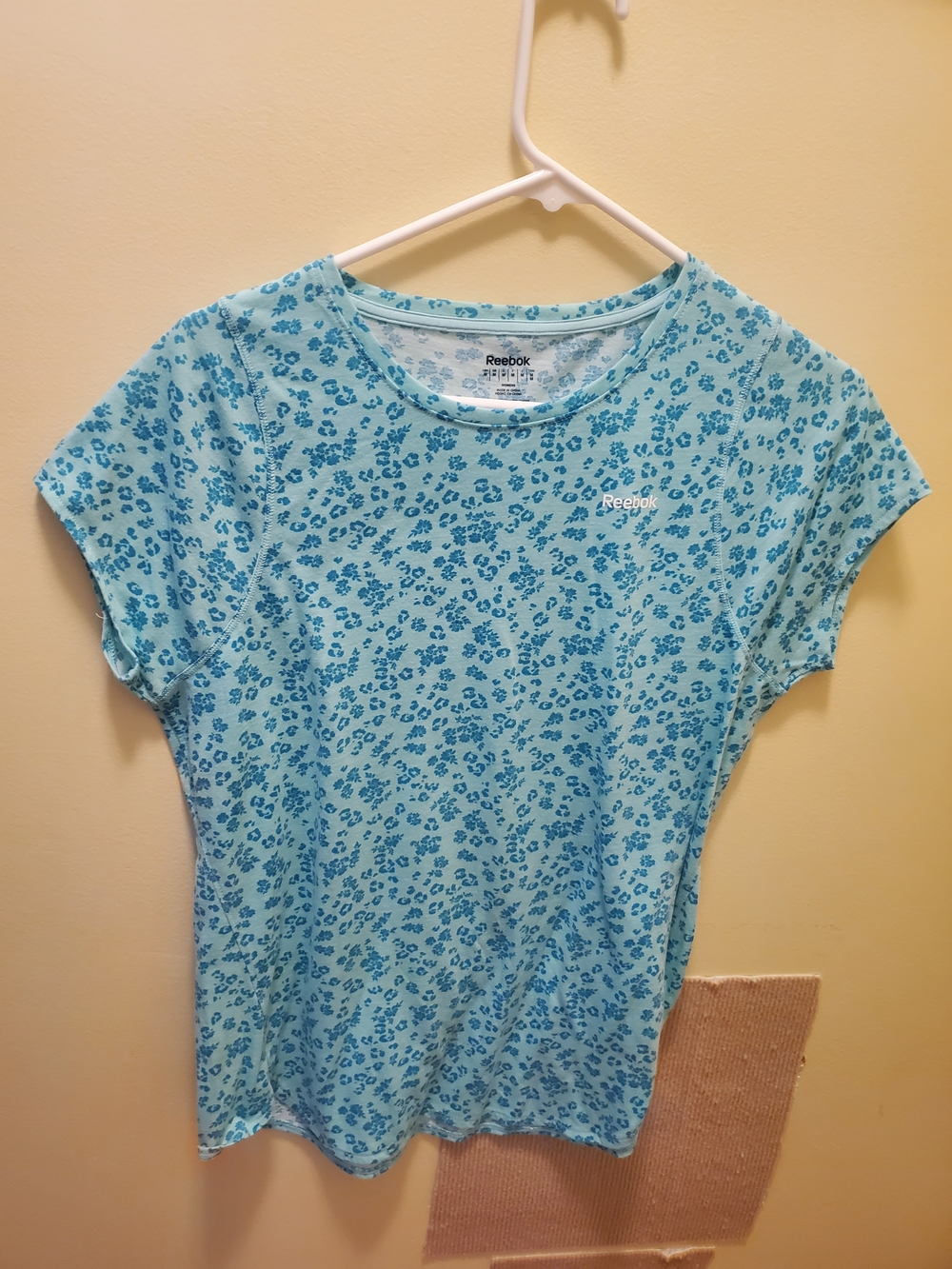 Reebok Women's Aqua Blue Floral Short Sleeve Tee